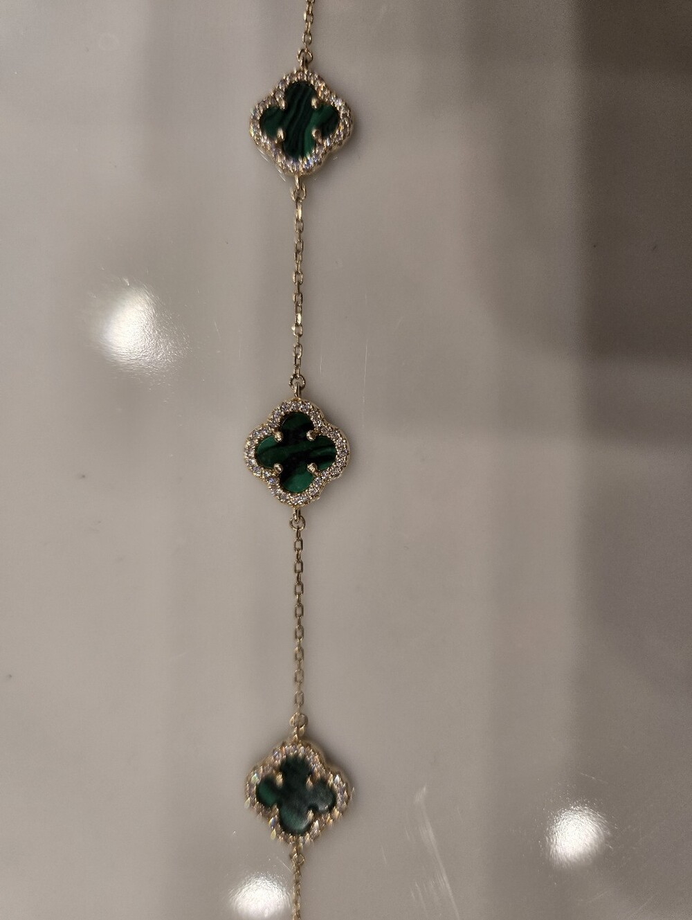 Gold Bracelet with Green Clover Stones